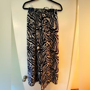 Animal print lounge pants with elastic top and string tie. Ankle length loungers
